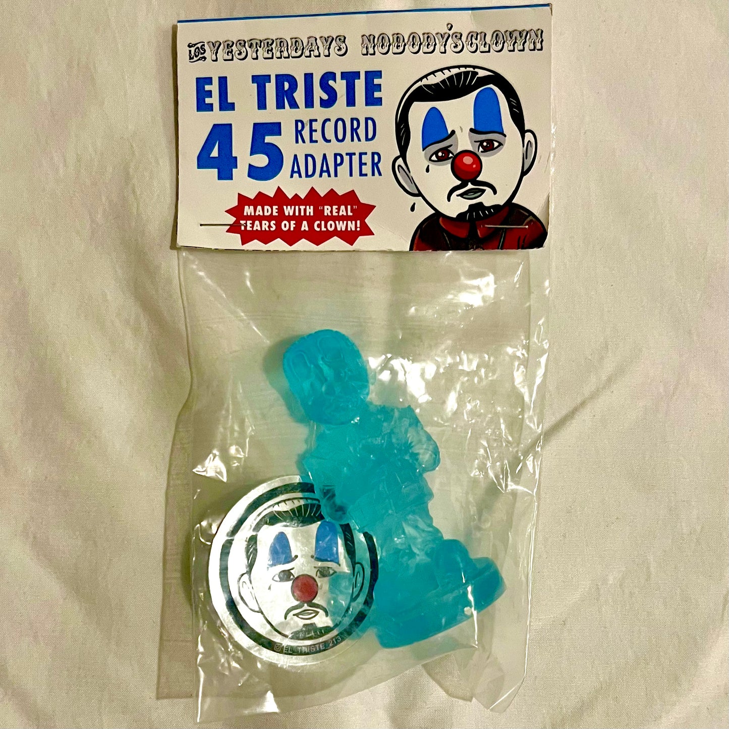 The El Triste "Cry Baby Blue" 45 Record Adapter